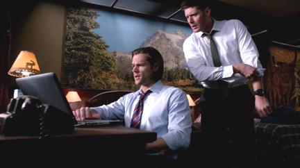 Sam and Dean read up on the Ghostfacers (love those shirts!). Sam and Dean read up on the Ghostfacers (love those shirts!).